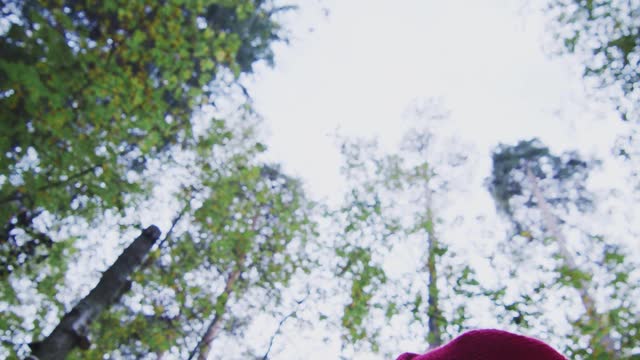 Boy Spinning in the Forest