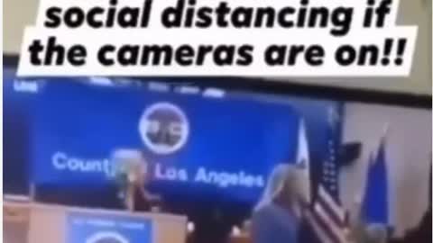 Hot mic catches LA county employee asking peopl to social distance only when the cameras are on