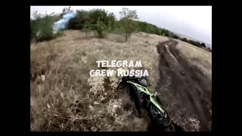 Russian Soldier Rides a Dirt Bike Protected by EW, Shoots a Drone Out of the Sky