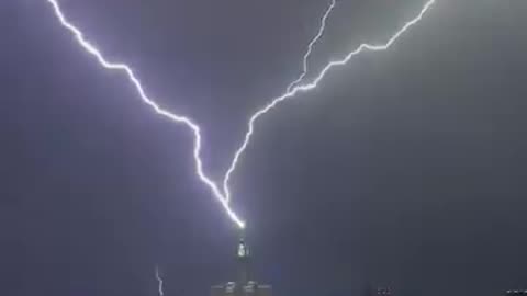 Lightning on clock tower in makkah