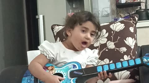 Riham and her guitar