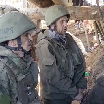 More Russians Crawl Out of the Woods and Surrender