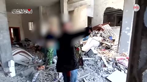 Al-Qassam Brigades striking a house where a Zionist force was entrenched, near the Al-Saftawi junction, west of Jabalia, Gaza, occupied Palestine, 23 Nov 2024