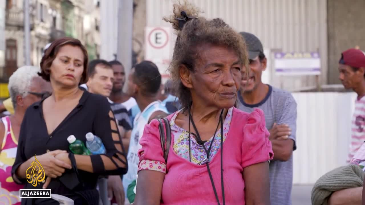 Brazil president accused of trying to buy votes with $7bn welfare bill
