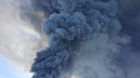 Black Smoke from Industrial Fire at Recycling Center Near Rogers, Arkansas Airport