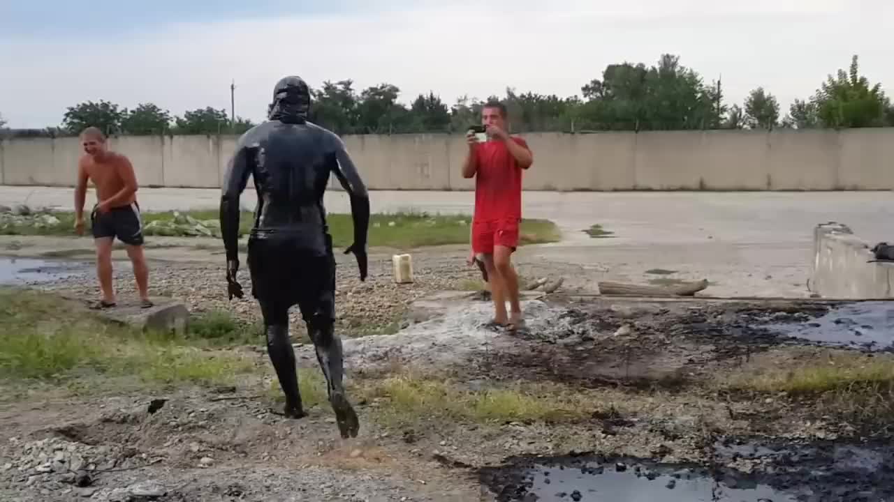 Guy jumps into pool of motor oil, immediately regrets it