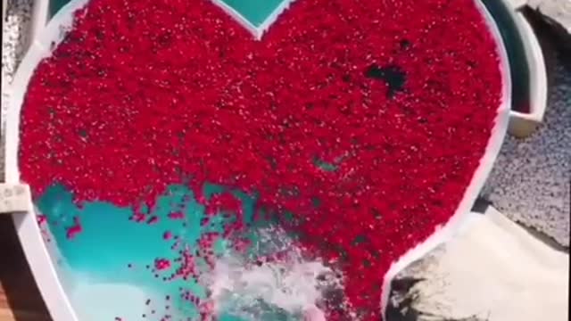 ENGLISH COUPLE JUMPED INTO HEART SHAPE POOL