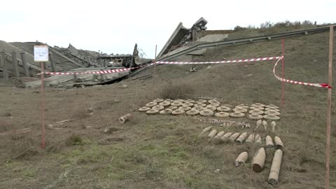 Ukrainian servicemen remove landmines in Kherson