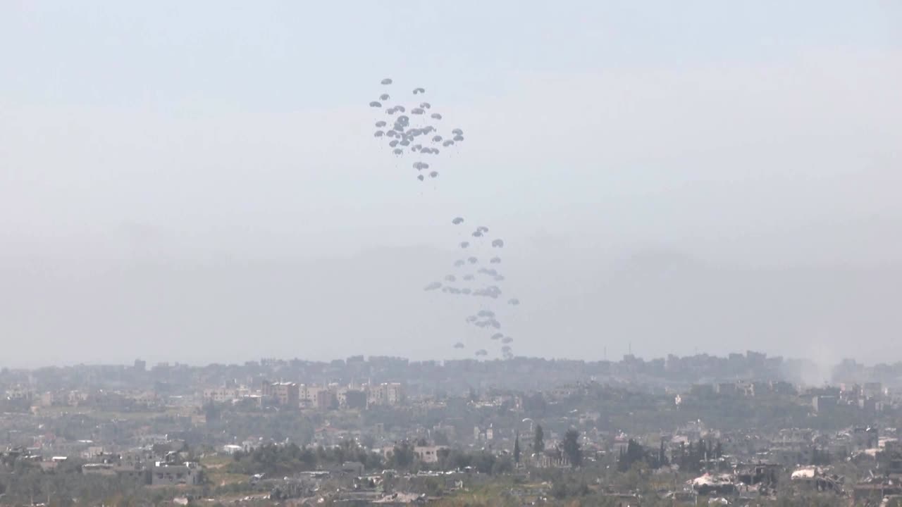 Pallets of aid are airdropped into northern Gaza