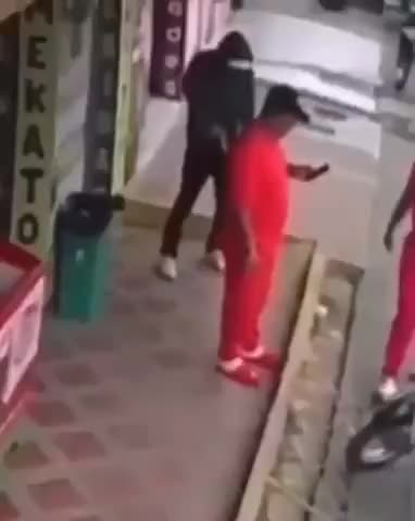 Clueless man on his phone doesn't realize that an assassin tried to kill him TWICE but his gun🔫 kept jamming!!