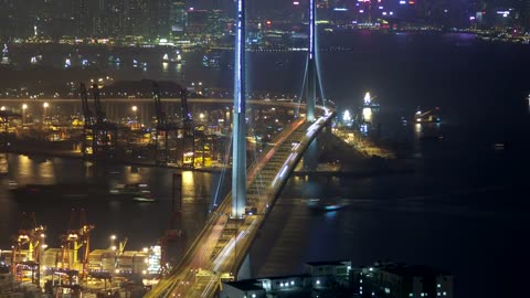 Hong Kong bay and bridge traffic at night