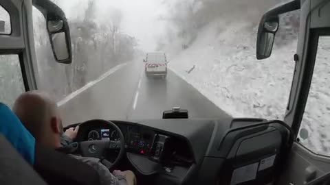 Bus drive snow fall