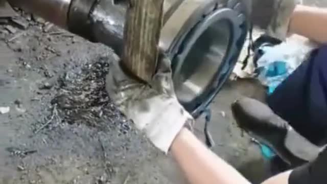 The repairman installs the parts