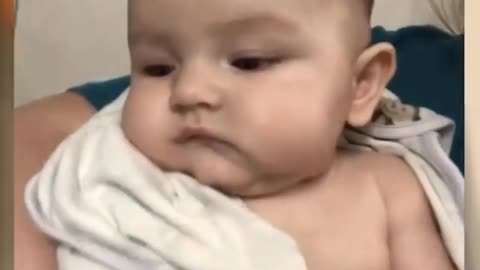 Funny baby laughing hysterically