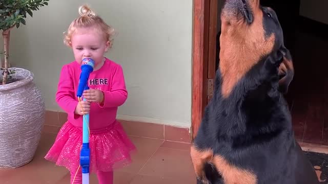 Toddler and Pet Dog Sing Together Loudly