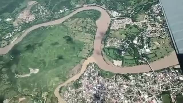 Guatemalan Air Force Surveys Flooding, Crop Damage Following Storm Julia