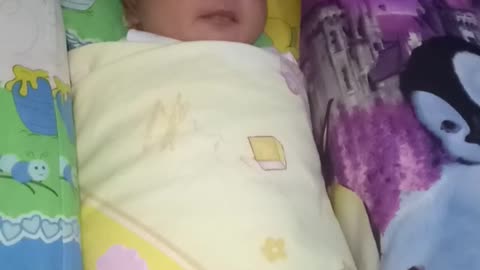 when my daughter is 2 weeks old, she looks beautiful and sweet.