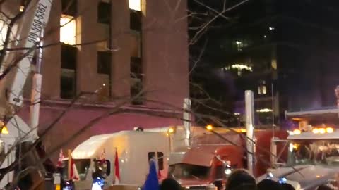 Truckers raise the Canadian Flag after Arriving at their Destination for a Massive Protest