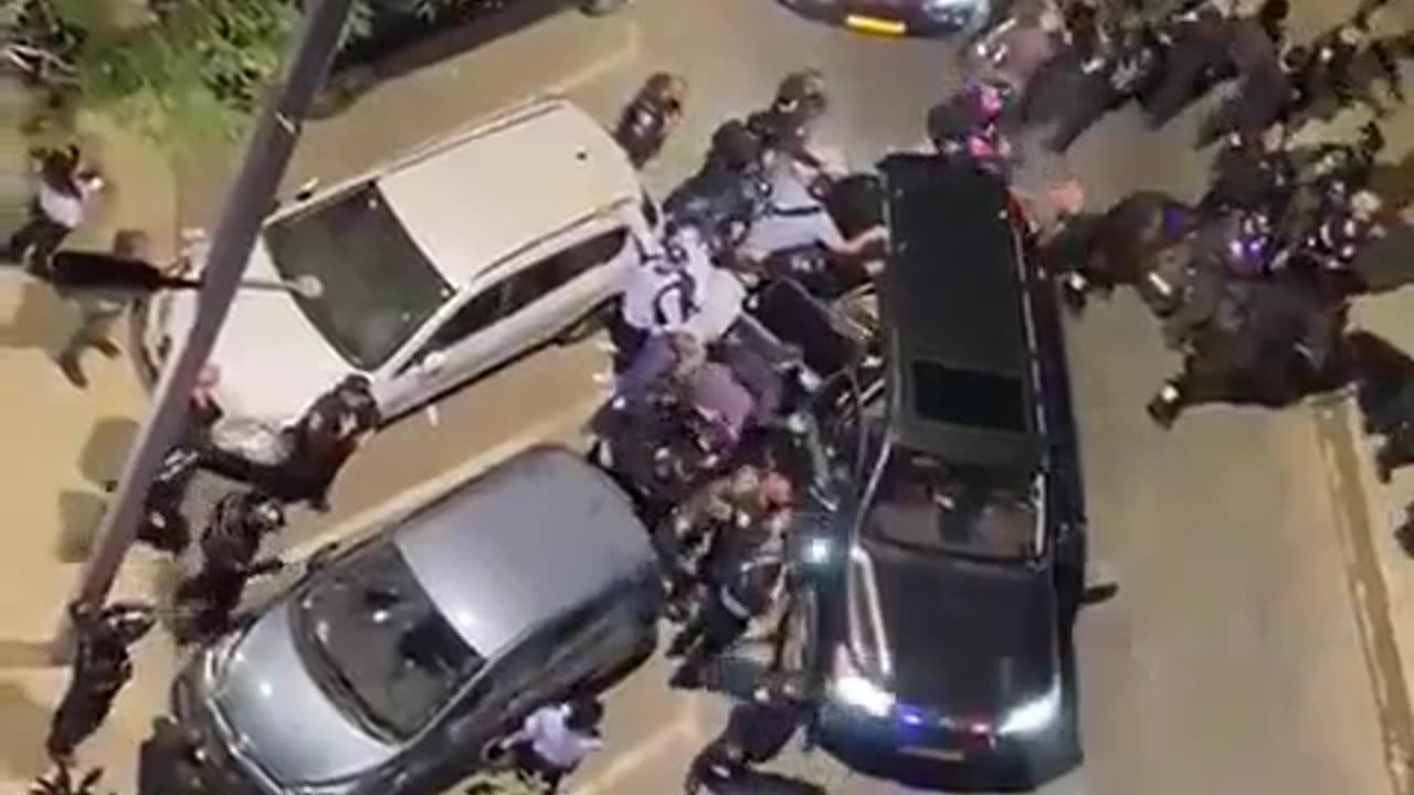 🚨WATCH: Wife of (Israel PM) escorted from hairdresser after being surrounded by protesters