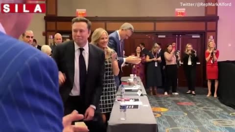 Moment Trump hails Musk before X boss bows to applauding crowd