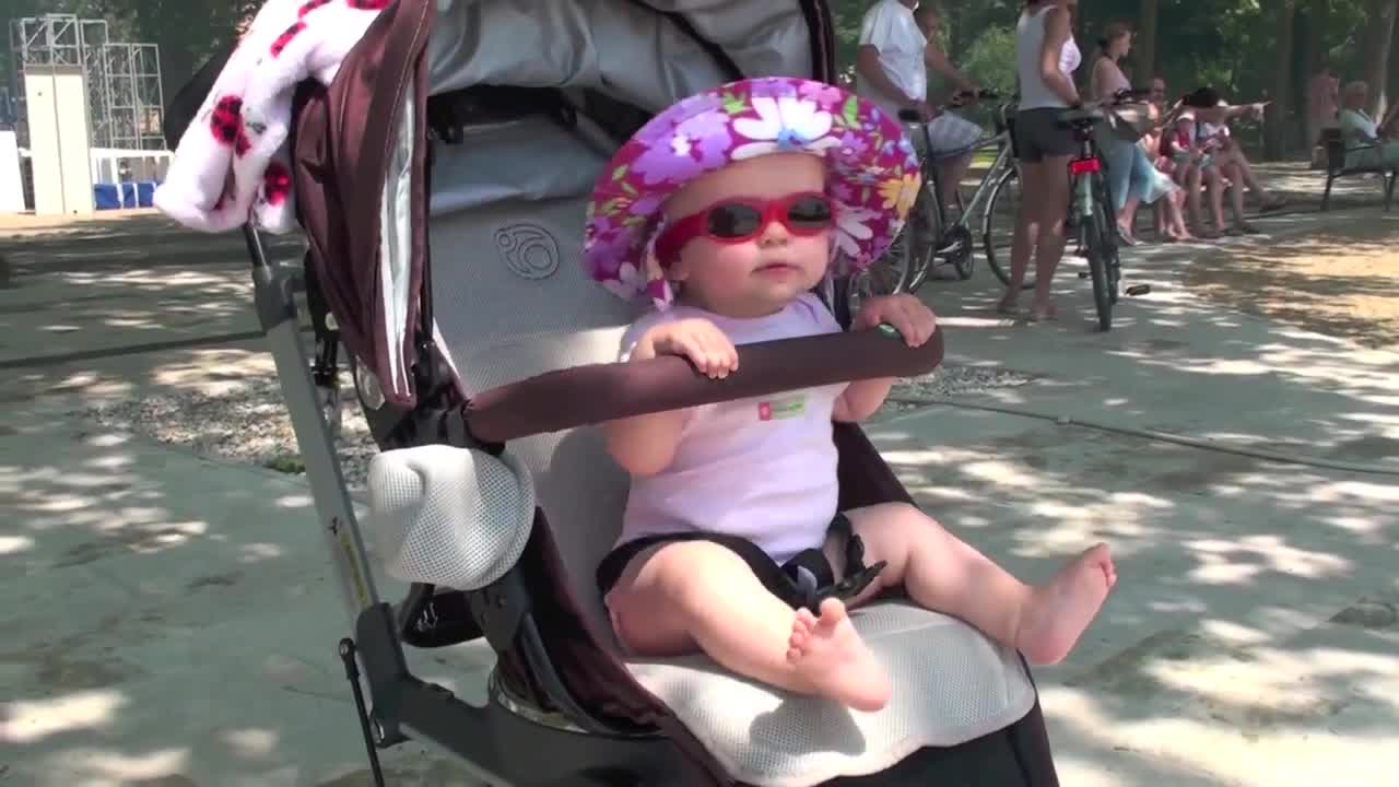 Cool baby dances in a stroller