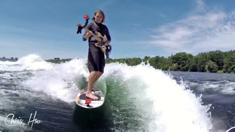 Surfing and playing electric guitar at the same time!