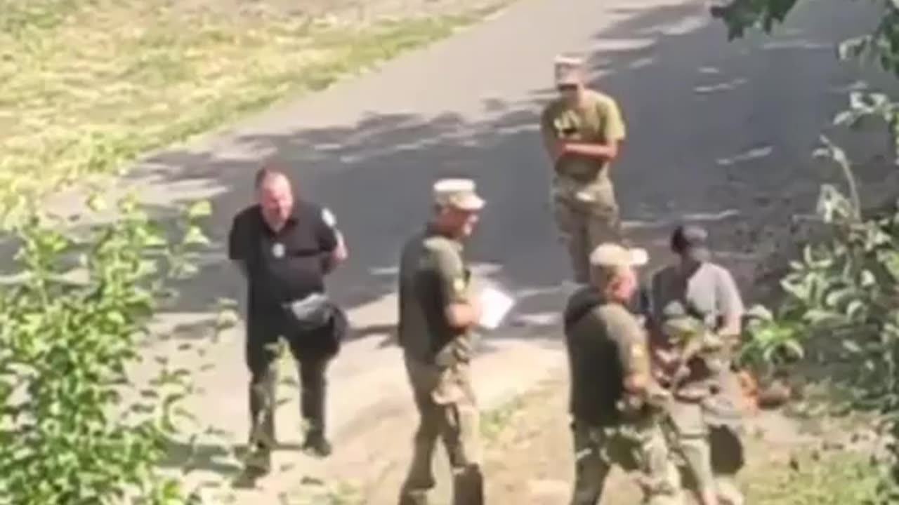 Ukrainian Zelensky regime's TCC abductors stops a Ukrainian man who they want to abduct