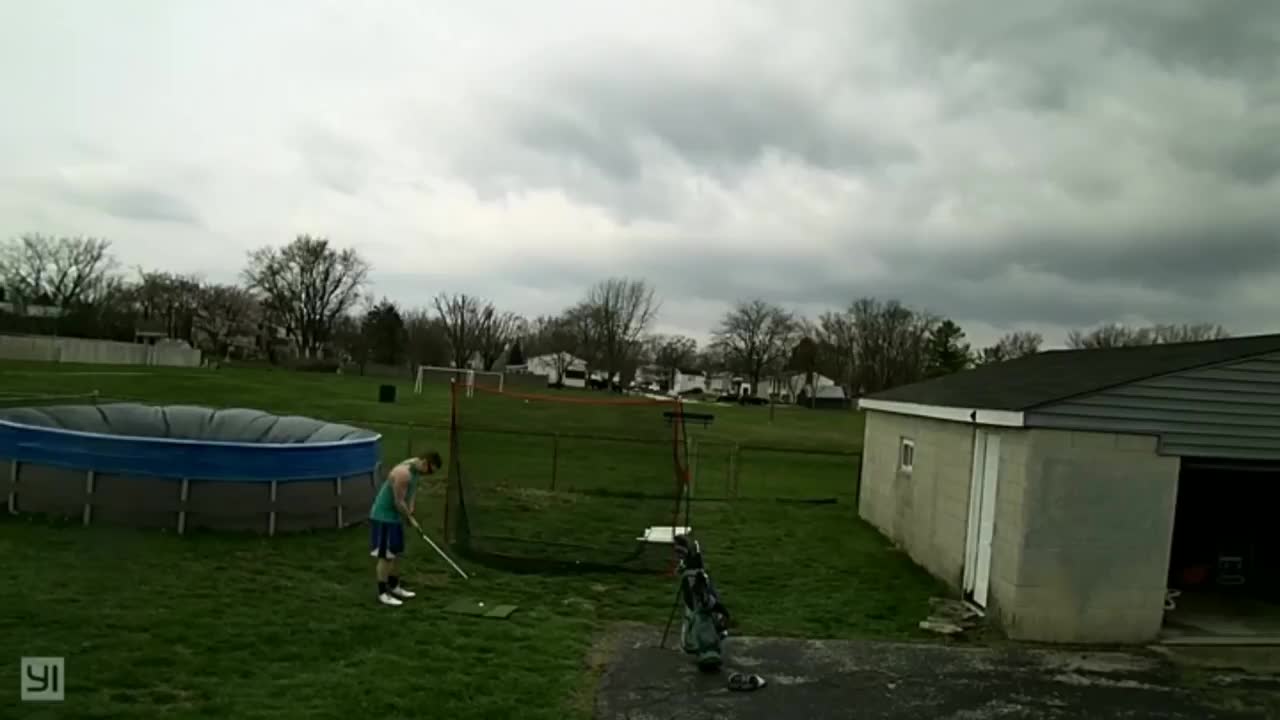 Guy Got Hit By A Sheet Of Metal While Practicing For A Golf Shot