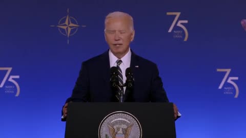 Biden, reading directly from a giant teleprompter