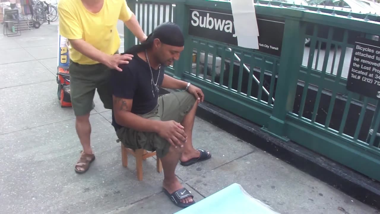 Luodong Massages Durag Man On Sidewalk