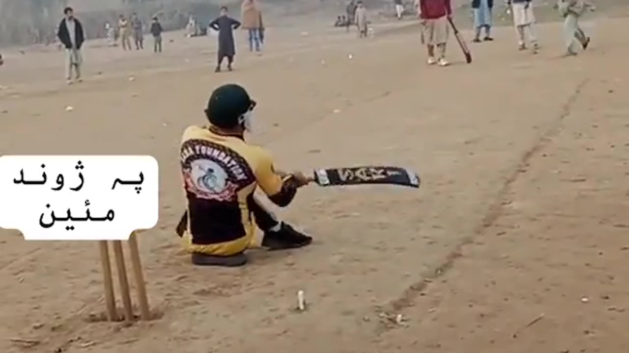 Disabled Man Playing Cricket