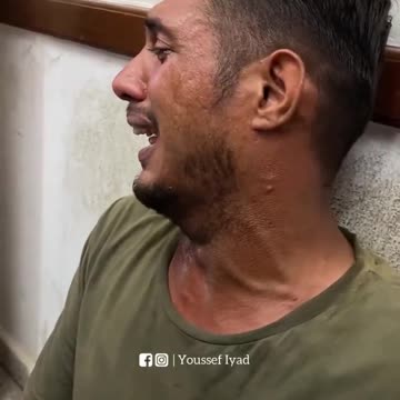 A Palestinian citizen weeps in the face of the israeli cold-blooded murder of...