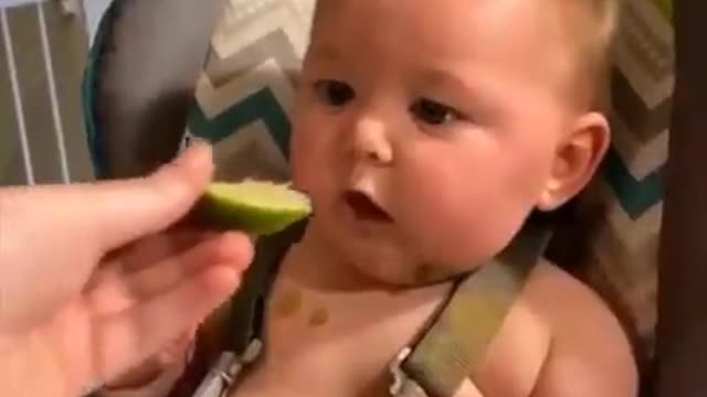 Cute Expression Babies Eating Lemon