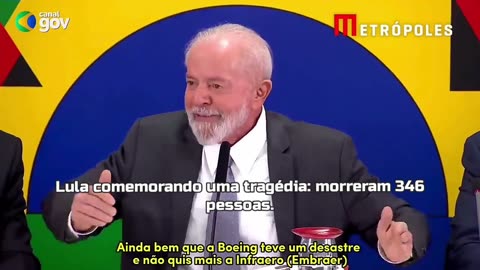 Lula comemorando publicamente uma tragédia: morreram 346 pessoas.