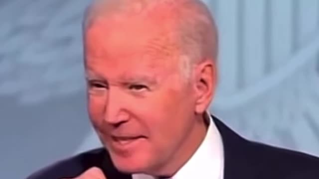 Biden giving the ‘hand’ sign.
