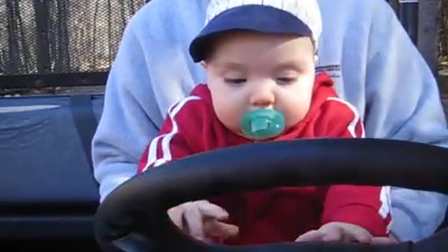 2005 Daniels first driving lessons from Dad on the RTV900.