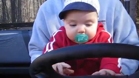 2005 Daniels first driving lessons from Dad on the RTV900.