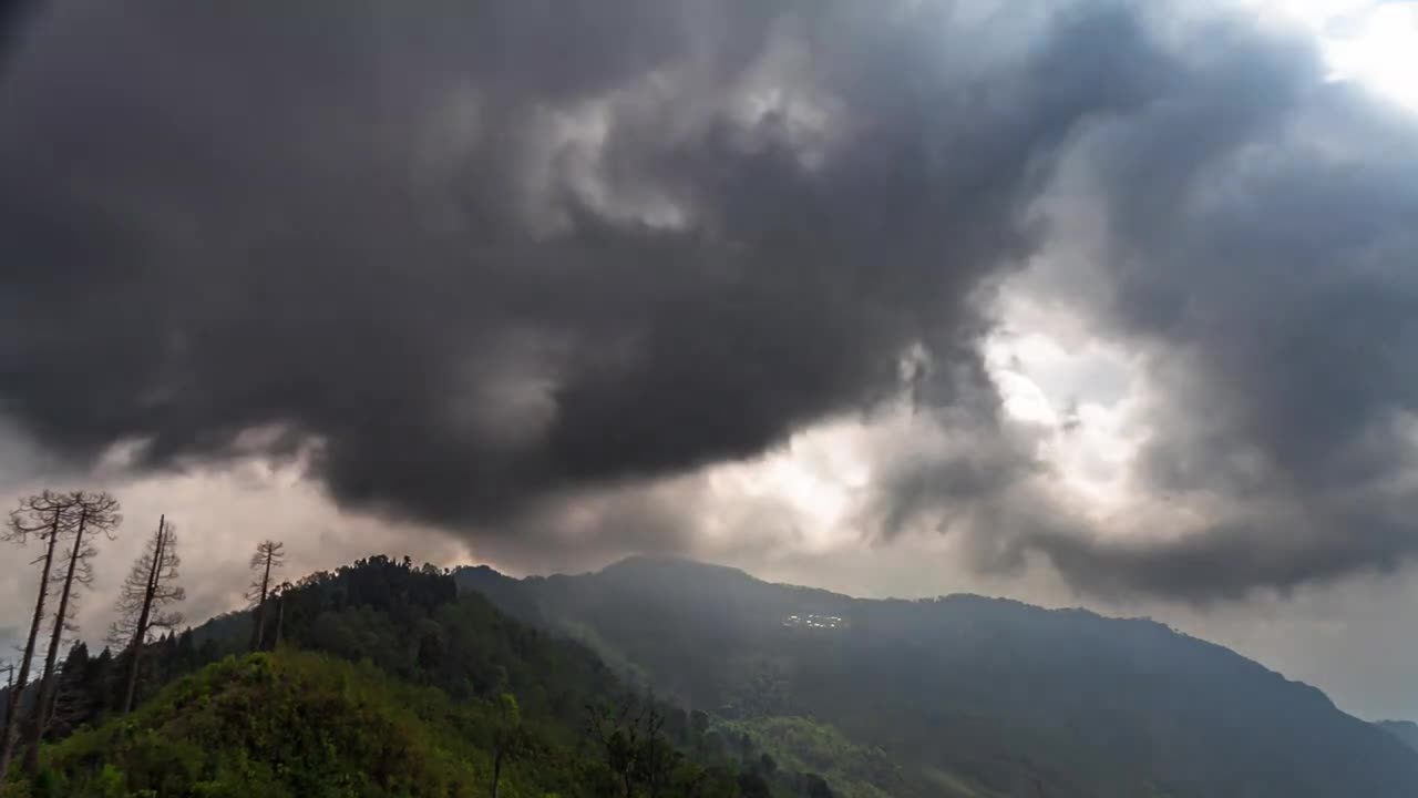 Rain Clouds at the Top of the Mountain - A Timelapse