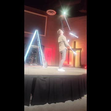 Ron Pearson is juggling with a chair on his face!