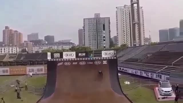 A racer shows off his super-high skills on a bicycle