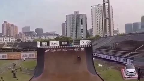 A racer shows off his super-high skills on a bicycle