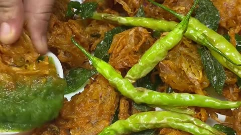 How to make gram flour and onion fritters and green coriander chutney