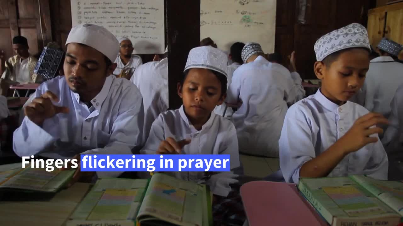 Signing the Koran Inside Indonesia's Islamic boarding school for the deaf AFP