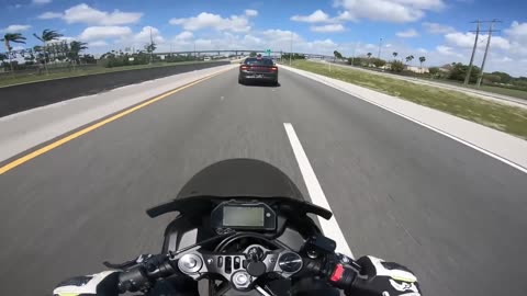 Shocking Incident: 🚓 Officer's Disturbing Act Causes Highway Bike Crash 😳