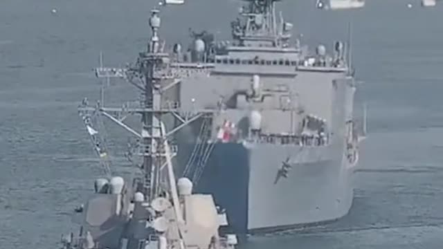 Two Navy ships steer at the last minute to avoid a head-on crash