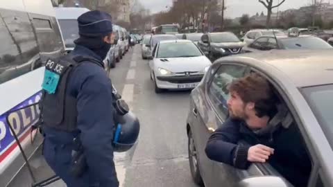 Police are Photographing the License Plates of All Cars at the Eiffel Tower, Including Tourists