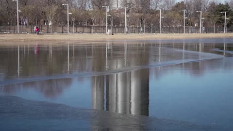 Beijing locals take selfies outside Olympic venue