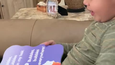February 10, 2022. Elijah reads ‘Bubbles, Bubbles’ book.