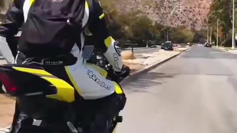 young man riding a motorcycle