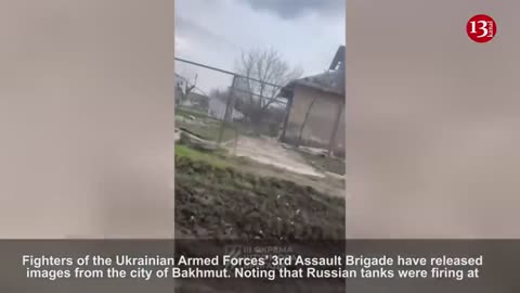 RUSSIAN SNIPER IS TRYING TO SHOOT US"- UKRAINIAN SOLDIERS SEEN WALKING IN THE STREETS OF BAKHMUT |